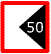 panneau blanc bordé de rouge, contenant un triangle noir avec le chiffre 50